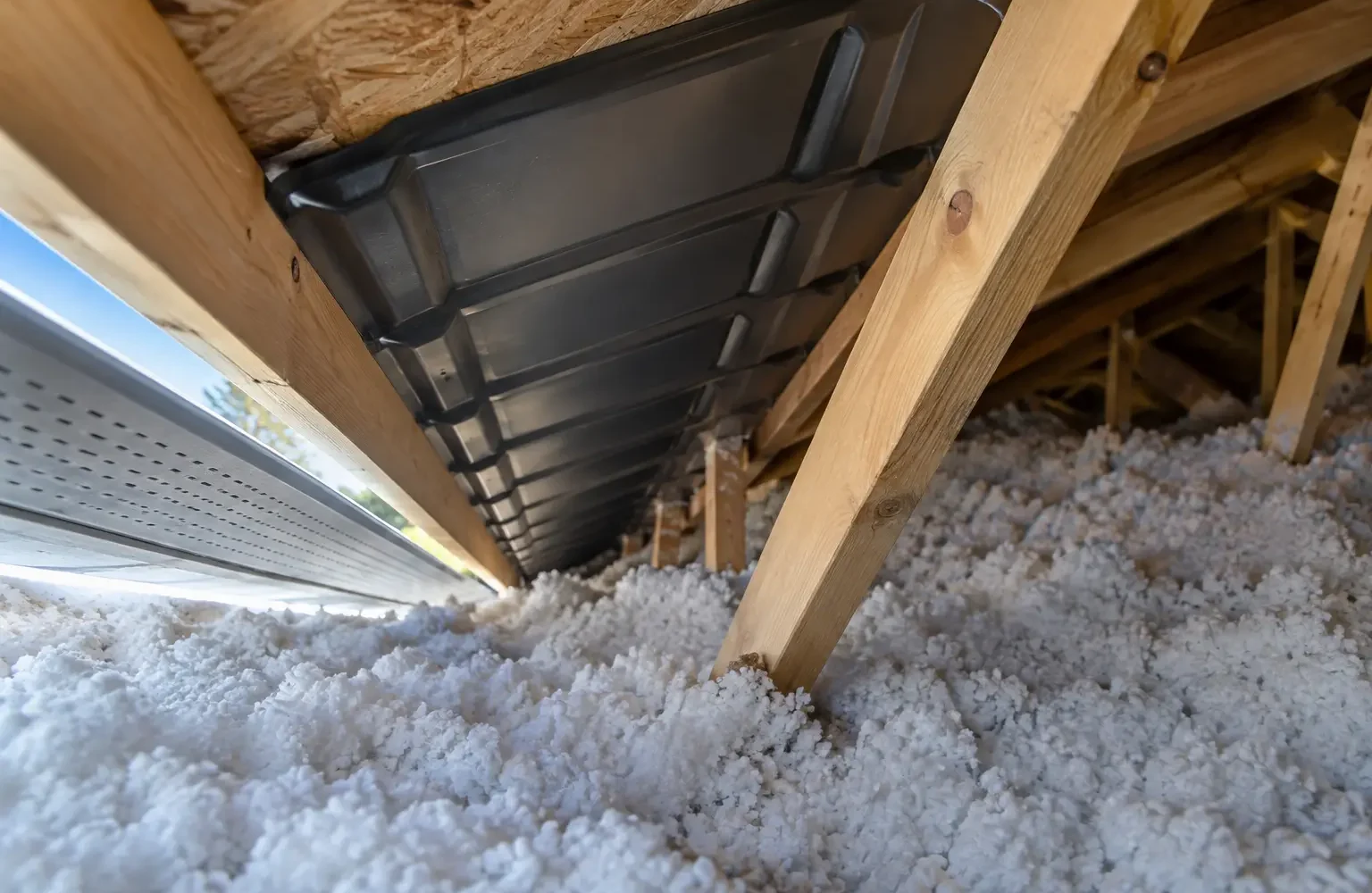 Clear ventilation path above insulation at the eaves